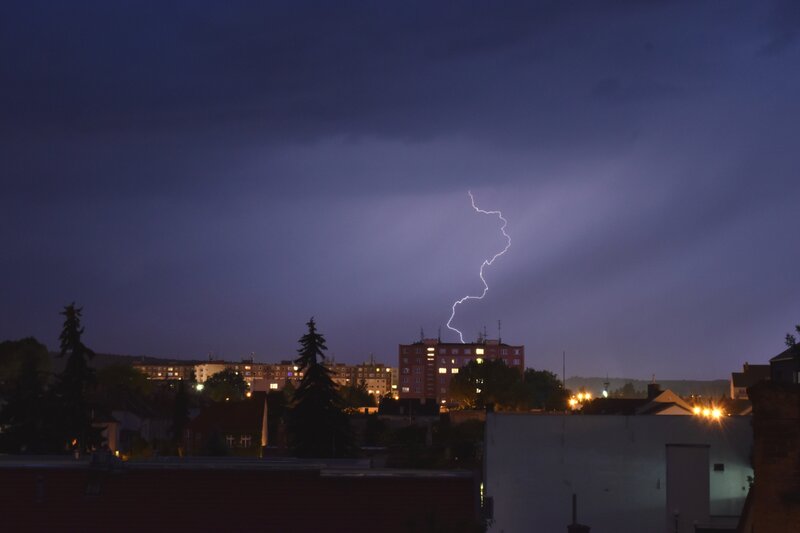 Lightning over City — Purple, Dramatic, Night, Photograph, Buildings, Trees, Sky
