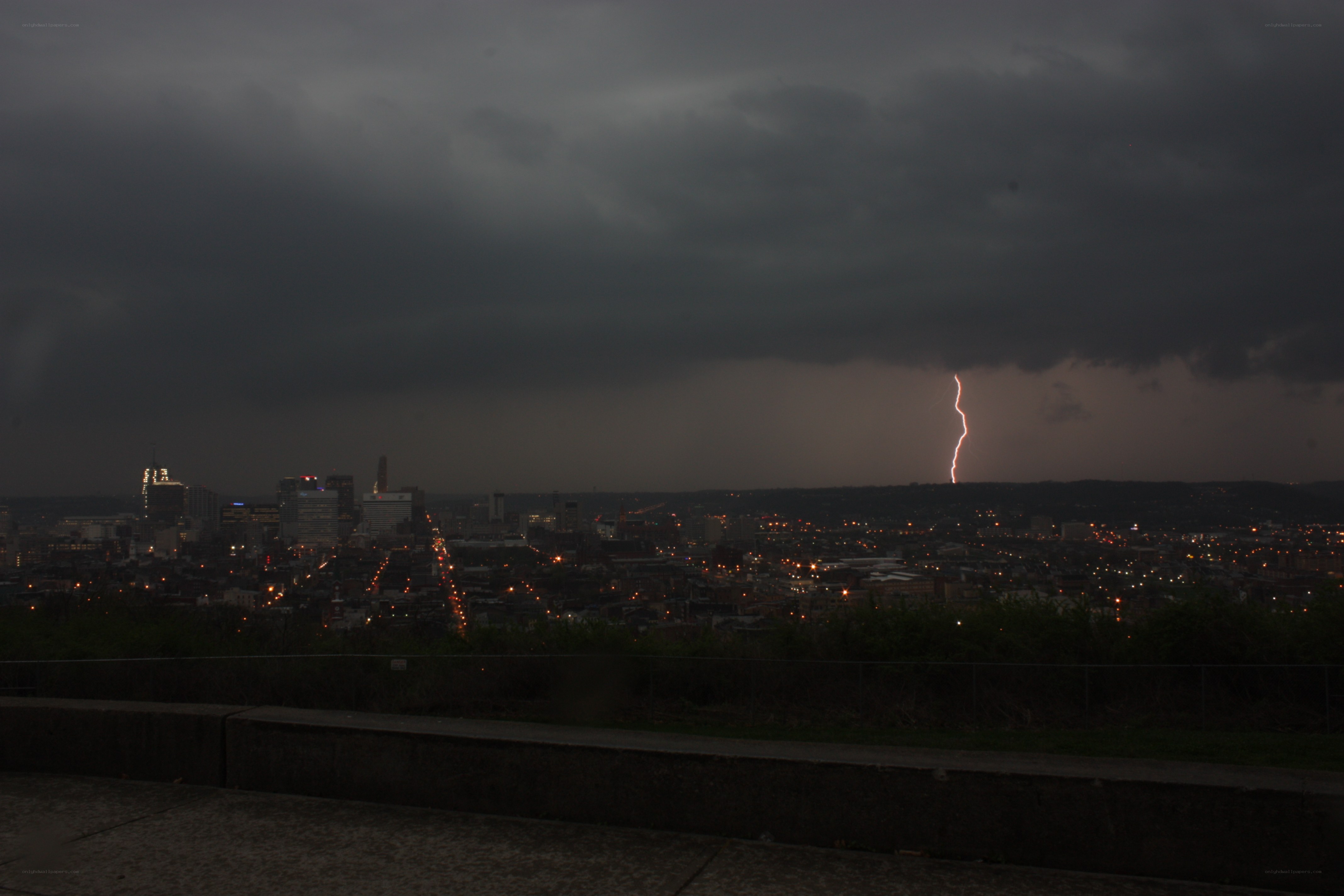 Lightning over city skyline