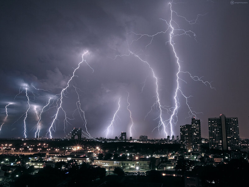 Lightning over city skyline