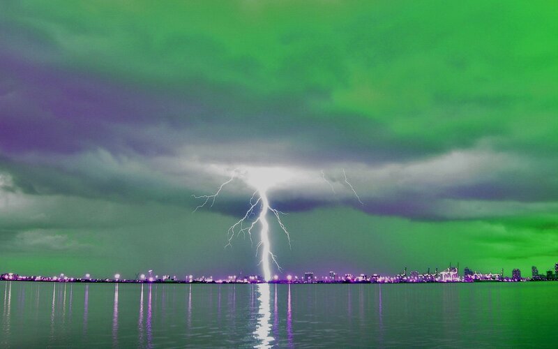 Lightning over city skyline