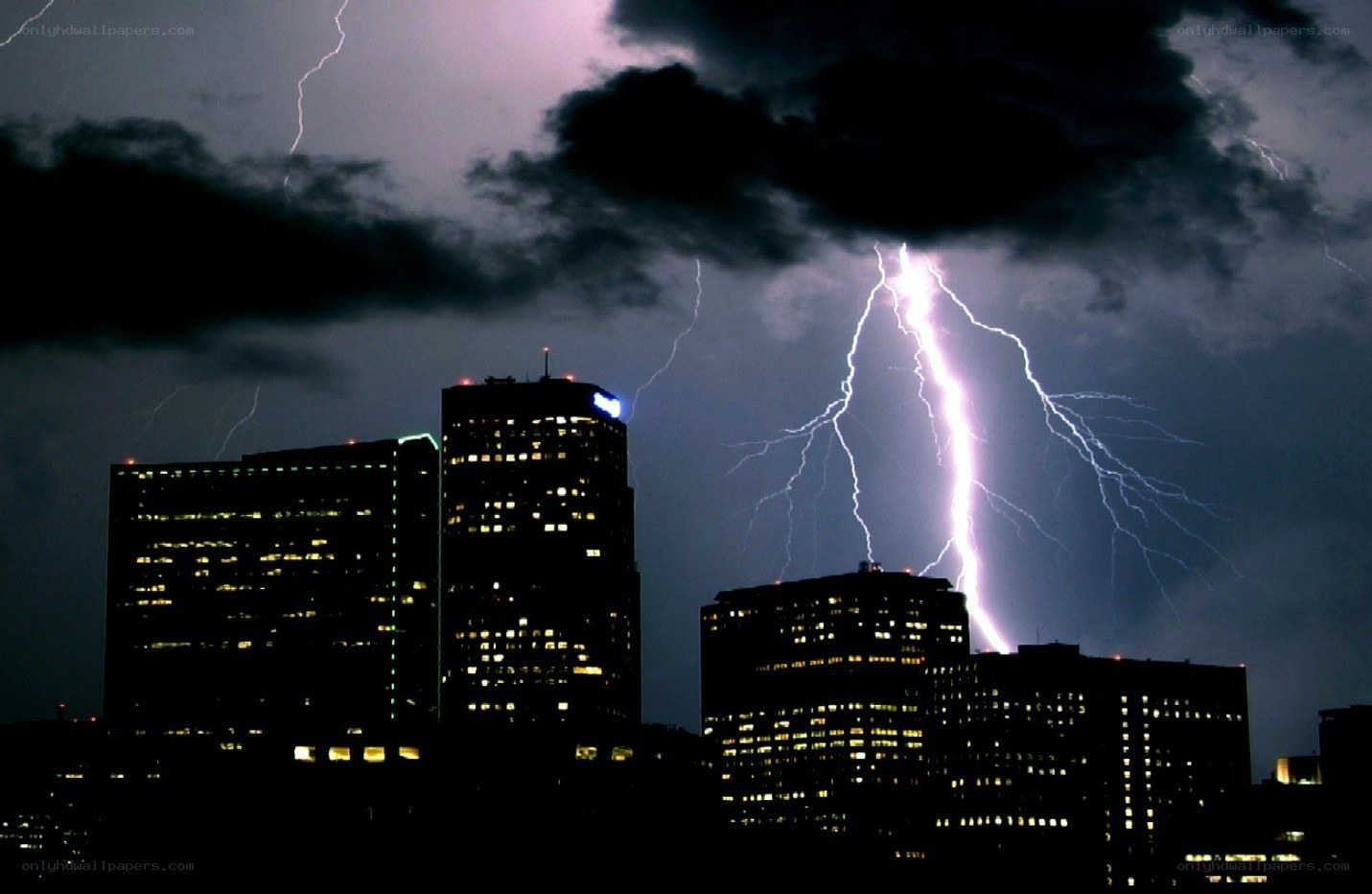 Lightning over city skyline