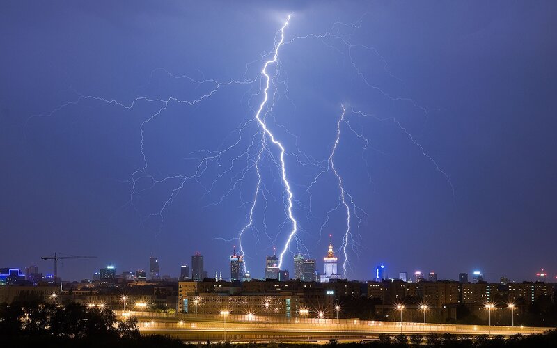 Lightning over city skyline
