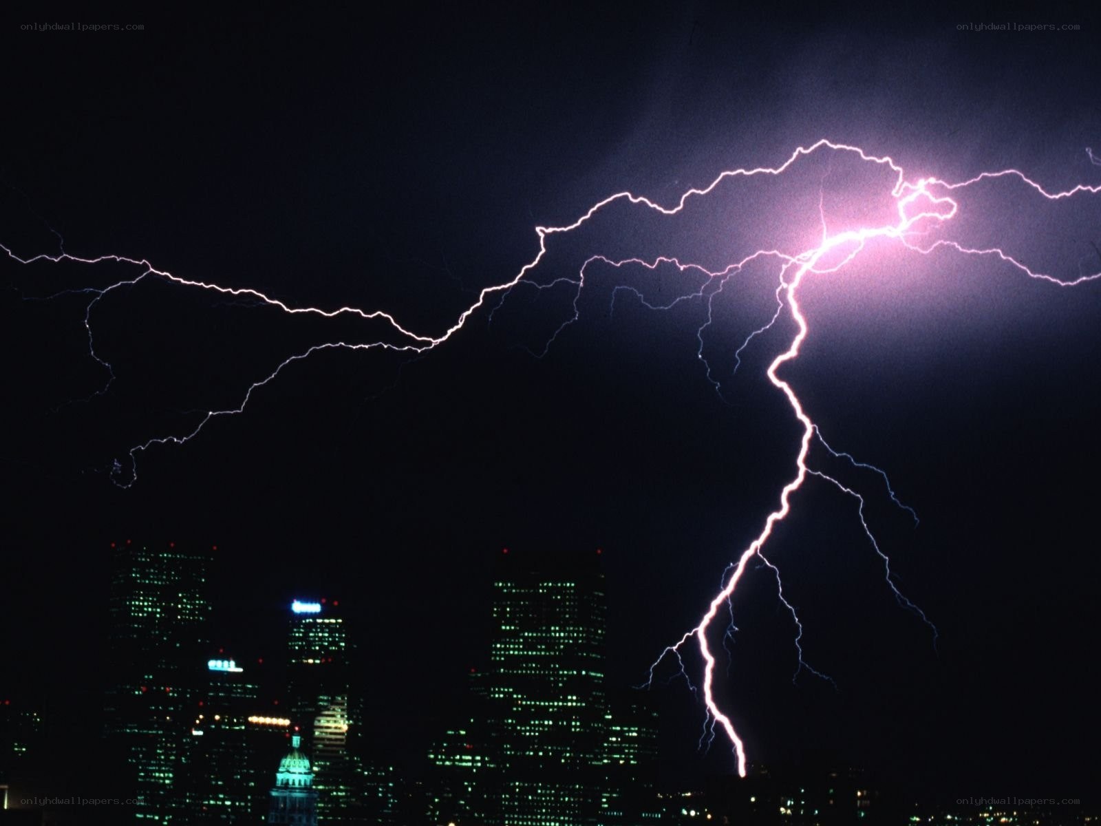 Lightning over city skyline