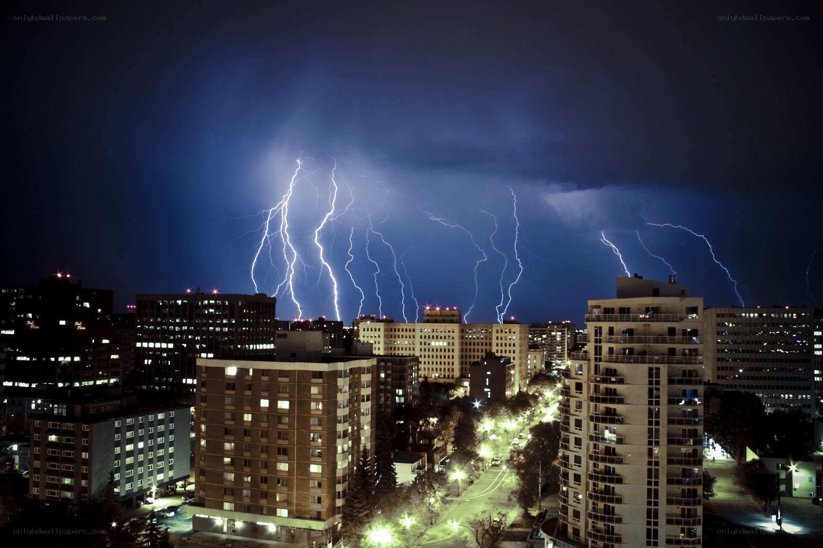 Lightning over city skyline