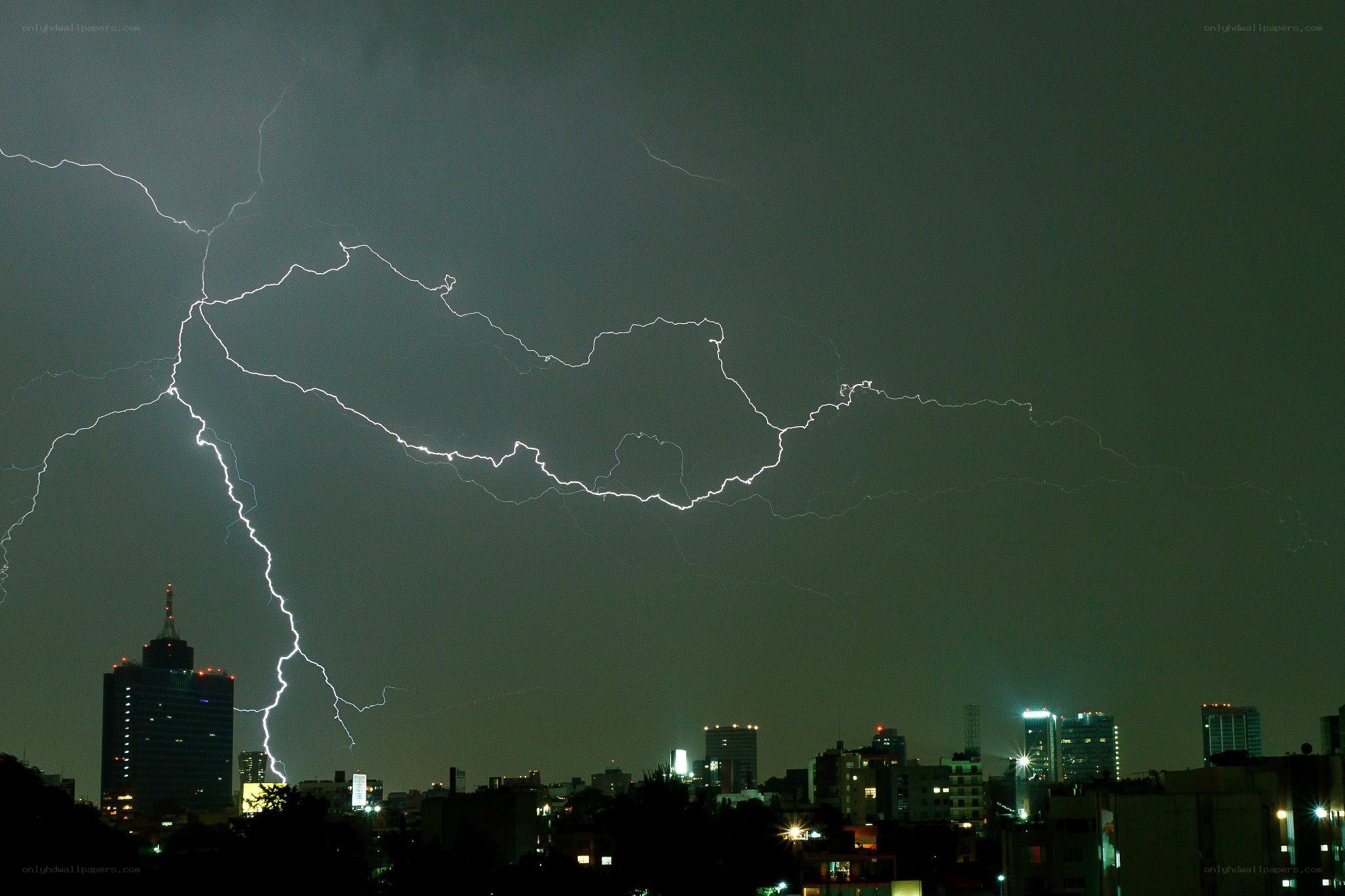 Lightning over city skyline