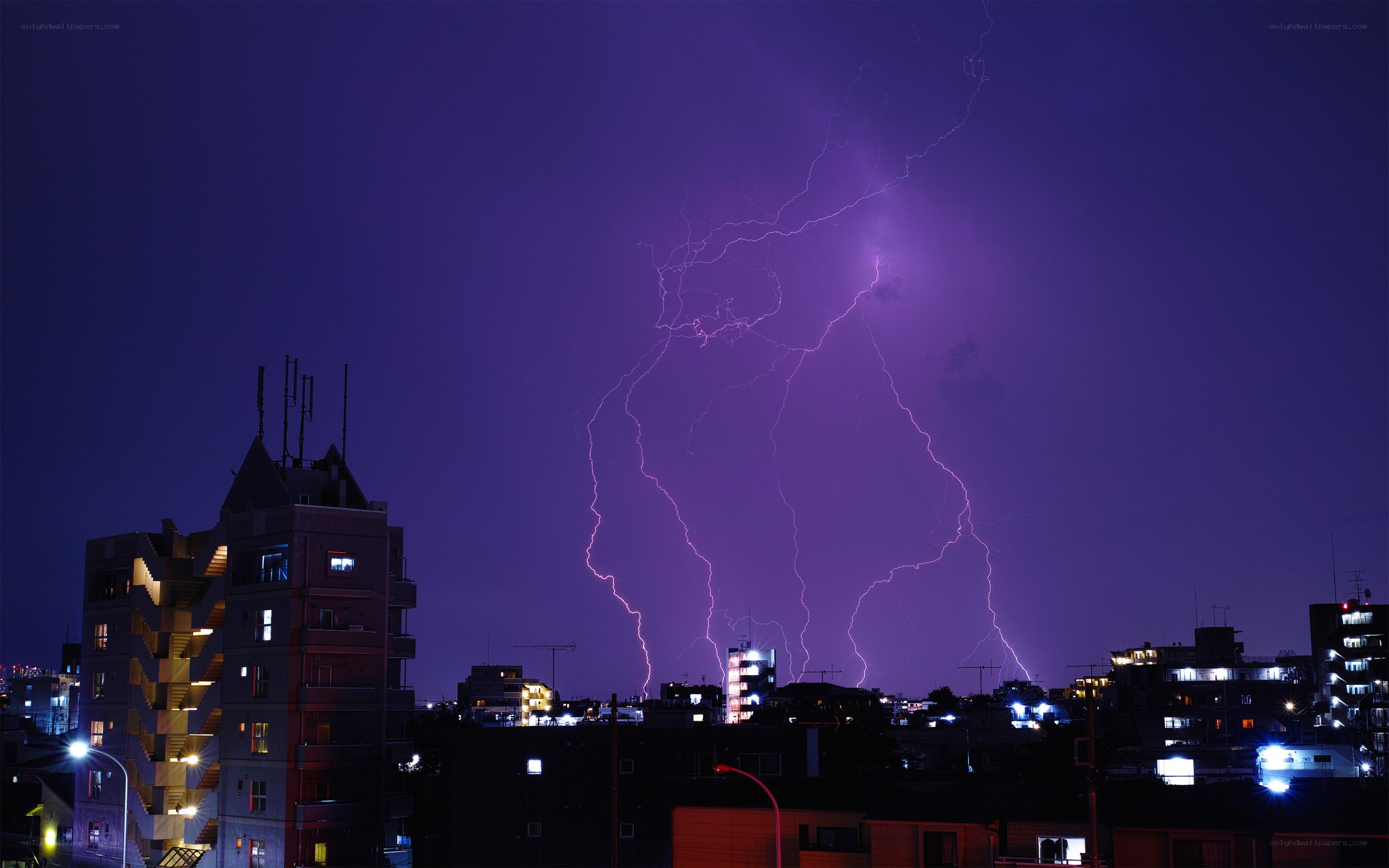 Lightning over city skyline