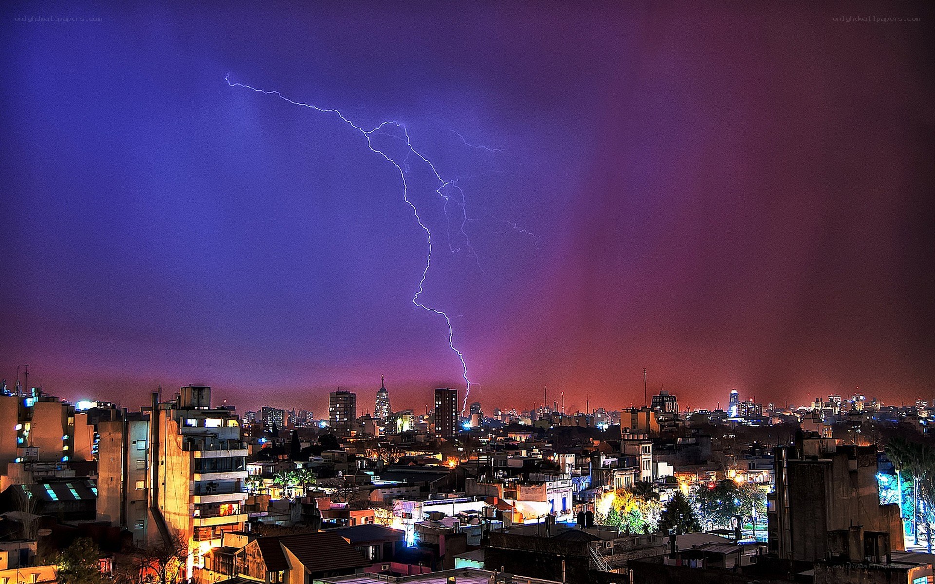Lightning over city skyline