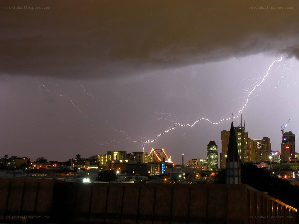 Lightning over city skyline