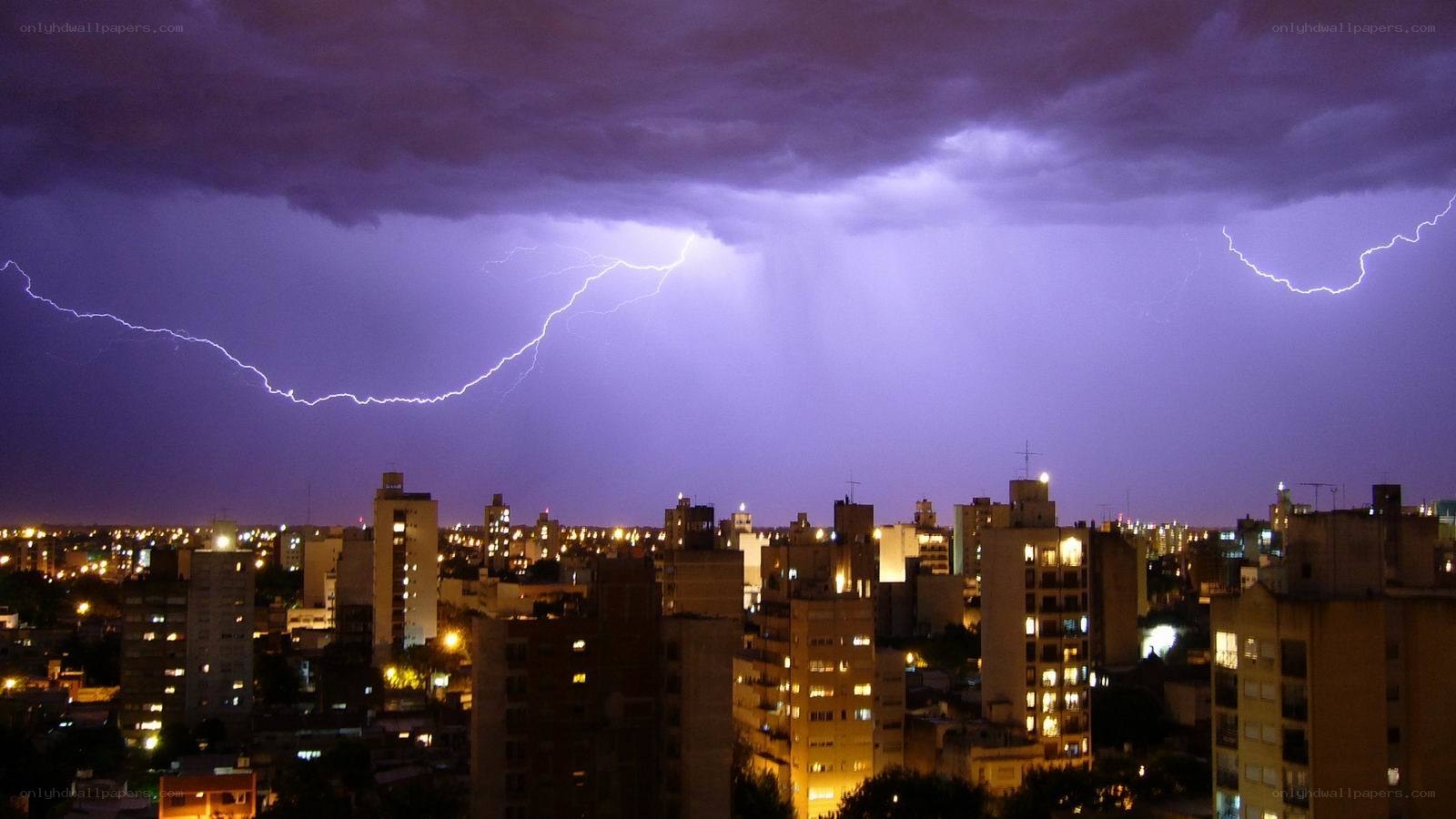 Lightning over city skyline
