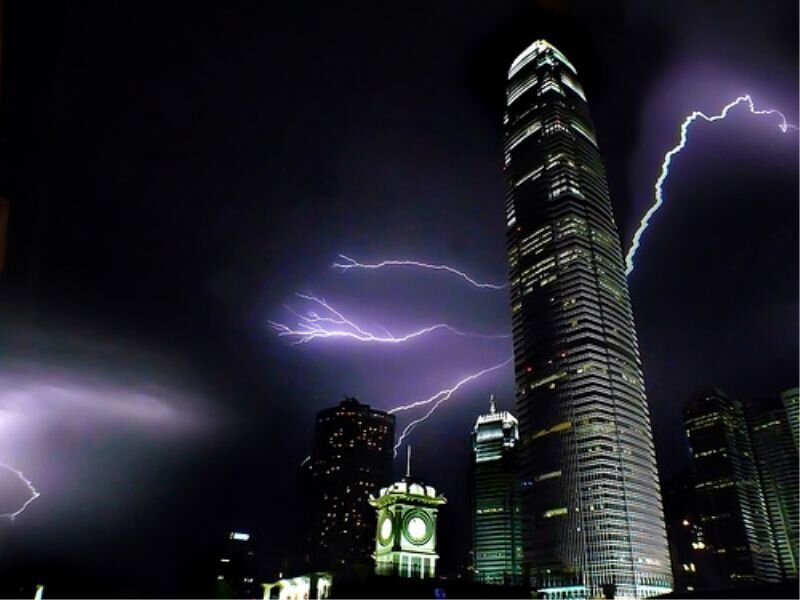 Lightning over city skyline