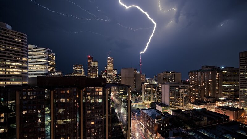 Lightning over City Skyline — Dark Blue