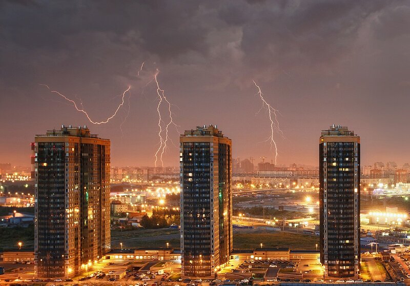 Lightning over city skyscrapers