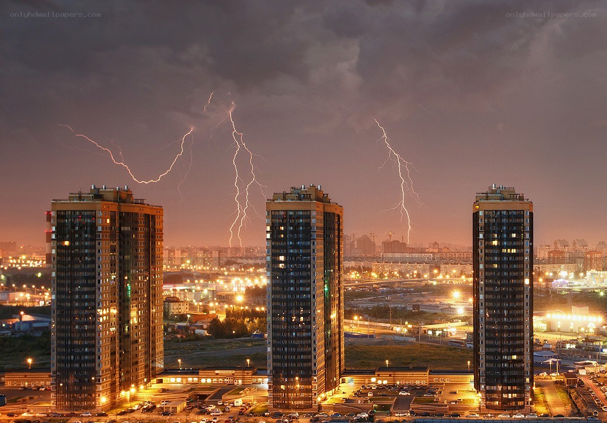 Lightning over city skyscrapers