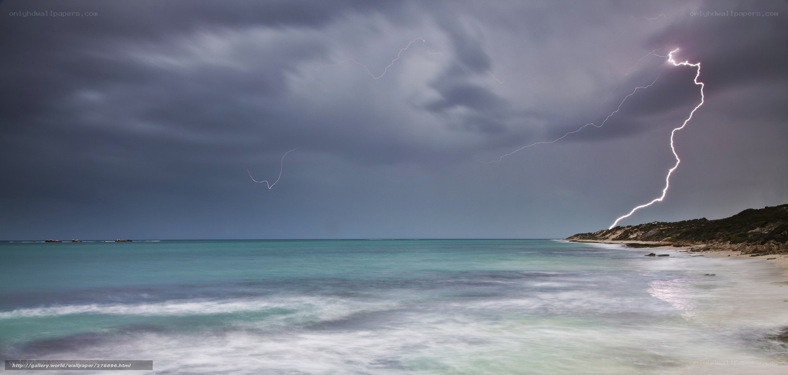 Lightning over coastal beach