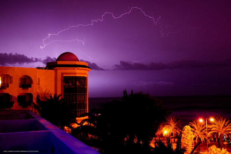 Lightning over coastal resort
