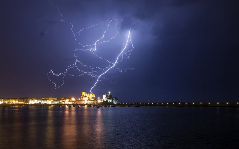 Lightning over Coastal Town — Blue