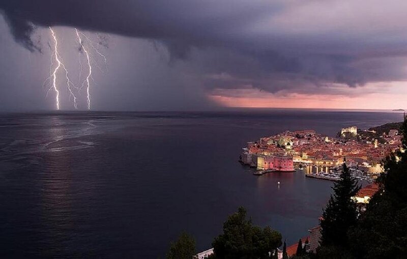Lightning over Coastal Town — Purple