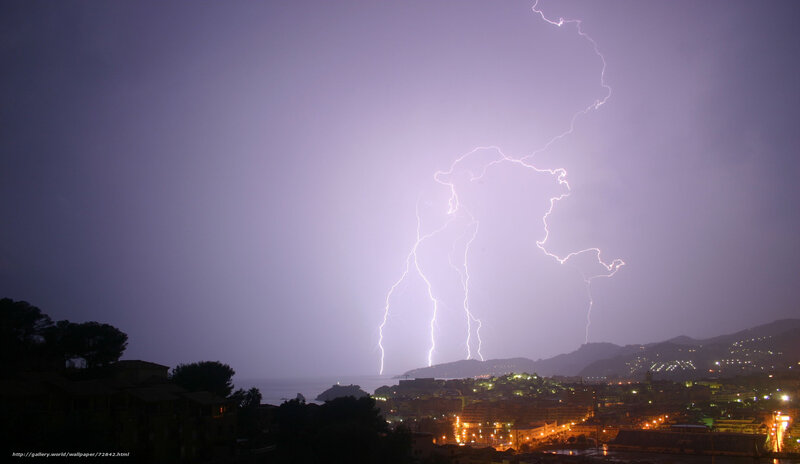 Lightning over coastal town