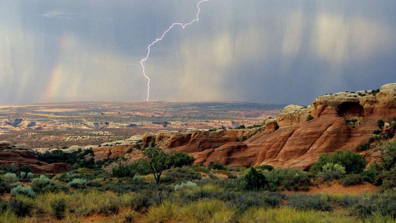 Lightning over desert canyon