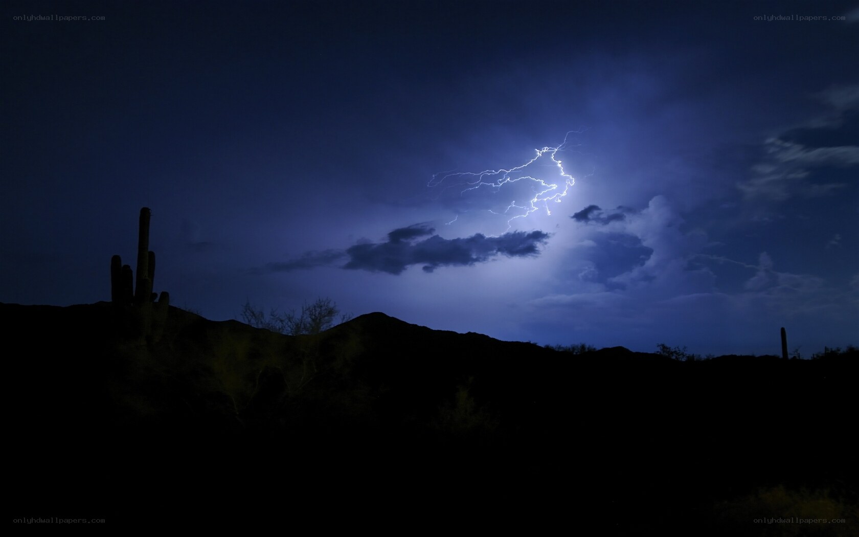 Lightning over desert landscape