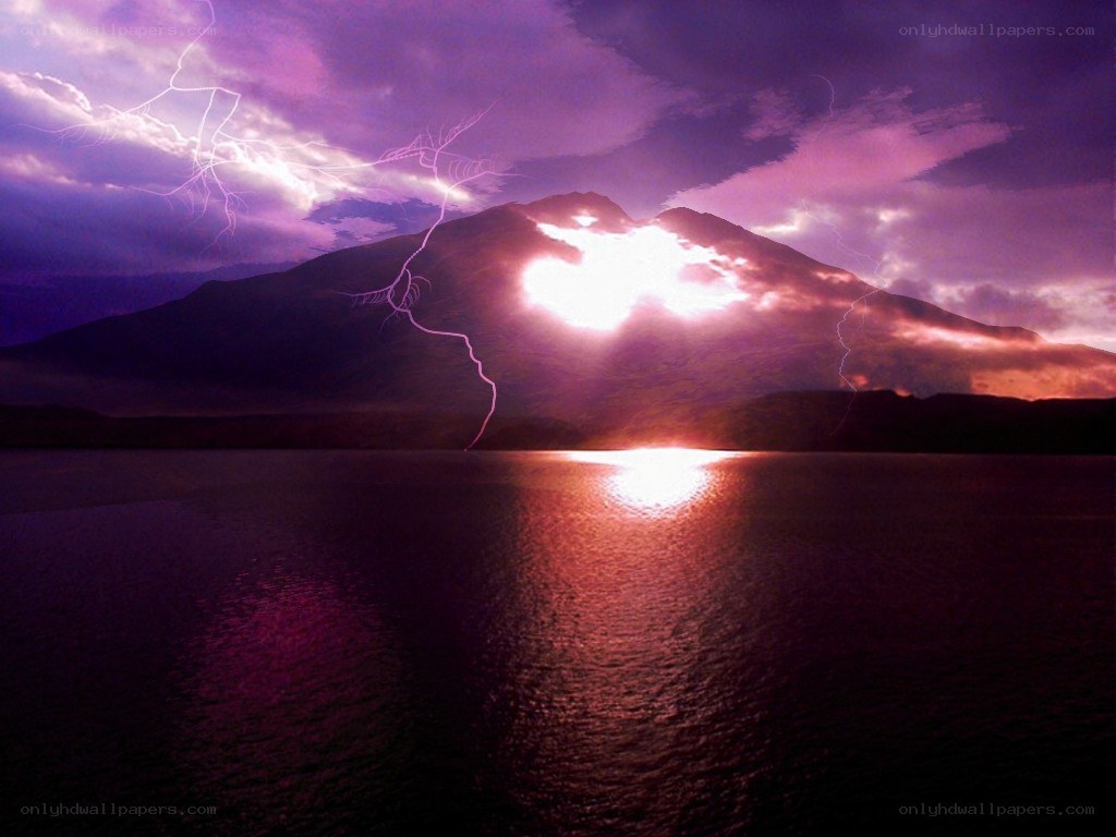 Lightning over mountain lake