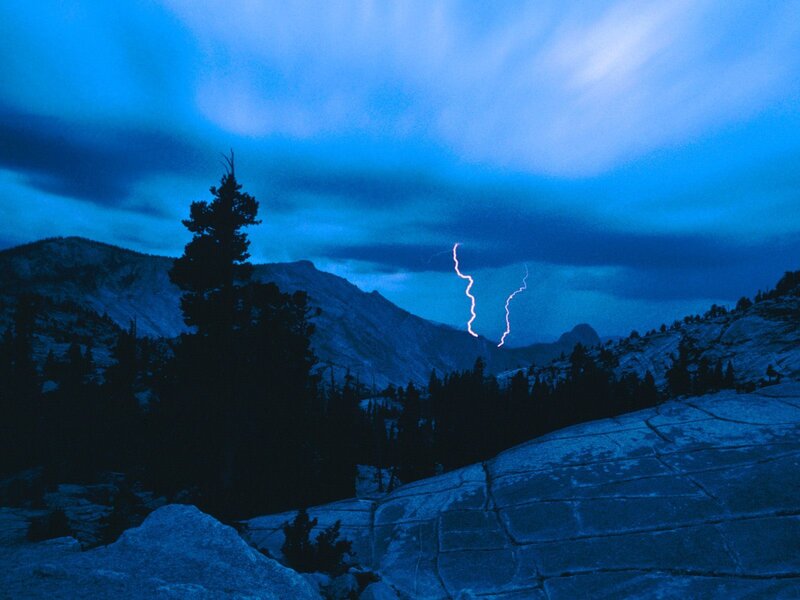 Lightning over mountain landscape