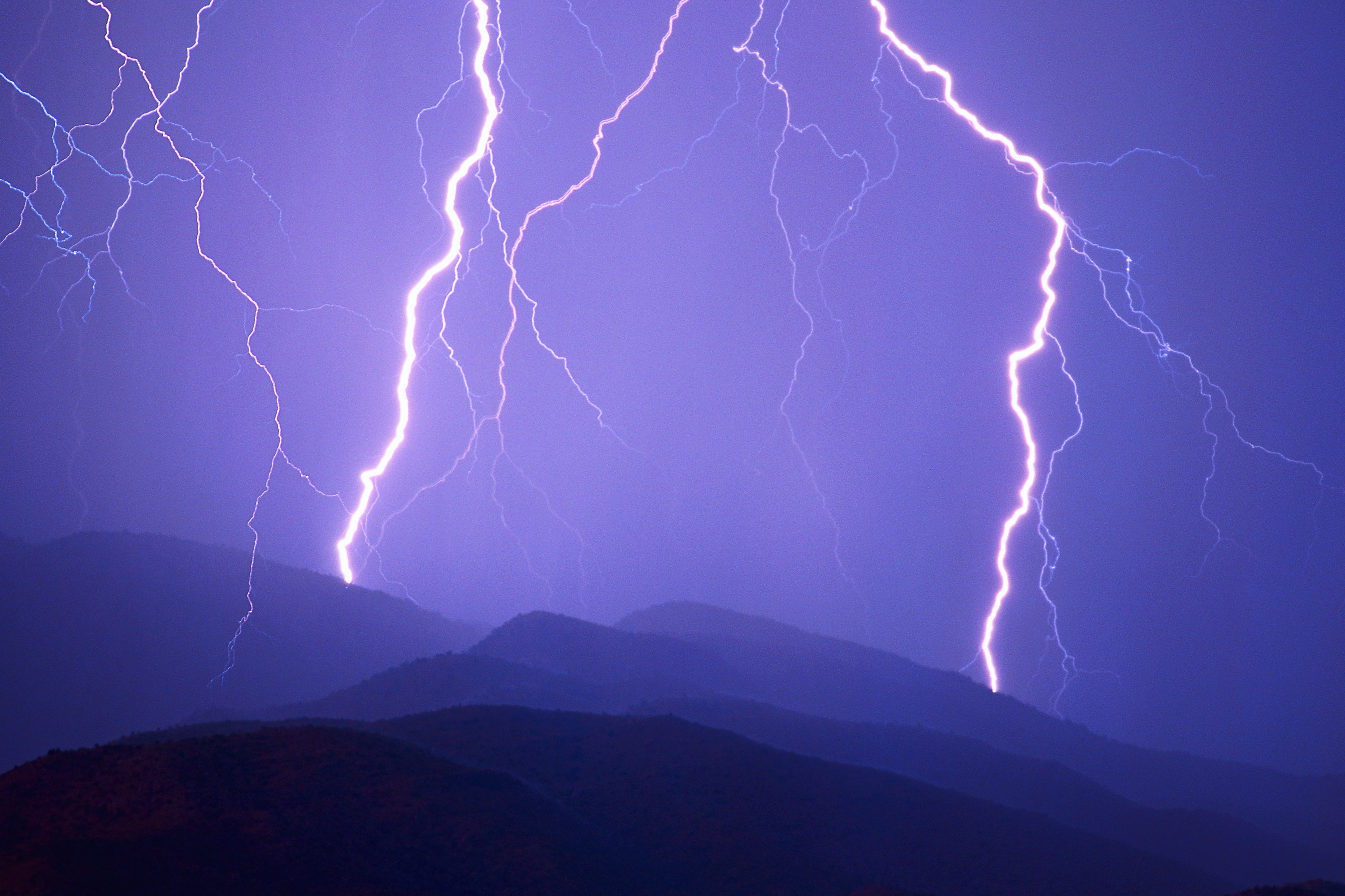 Lightning over mountain range