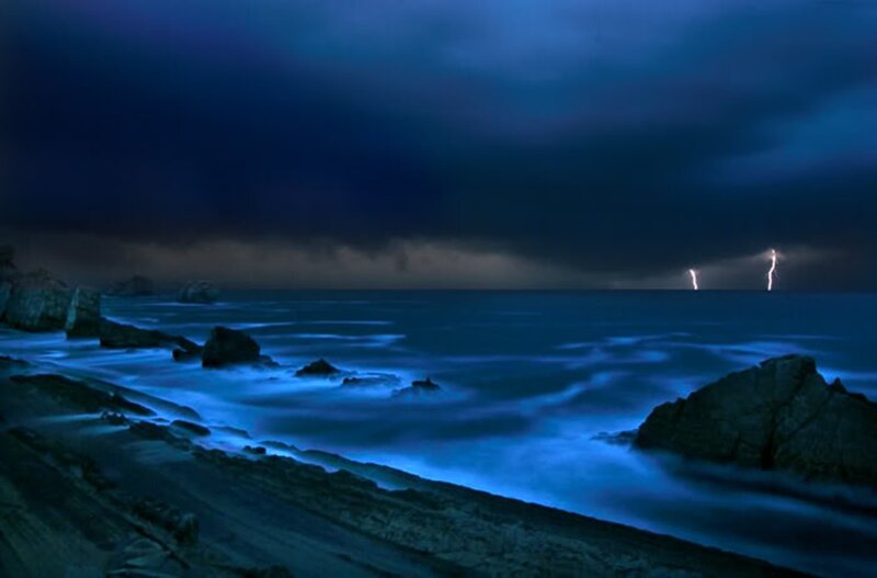 Lightning over Ocean — Blue, Dramatic, Night, Photograph, Storm, Rocks
