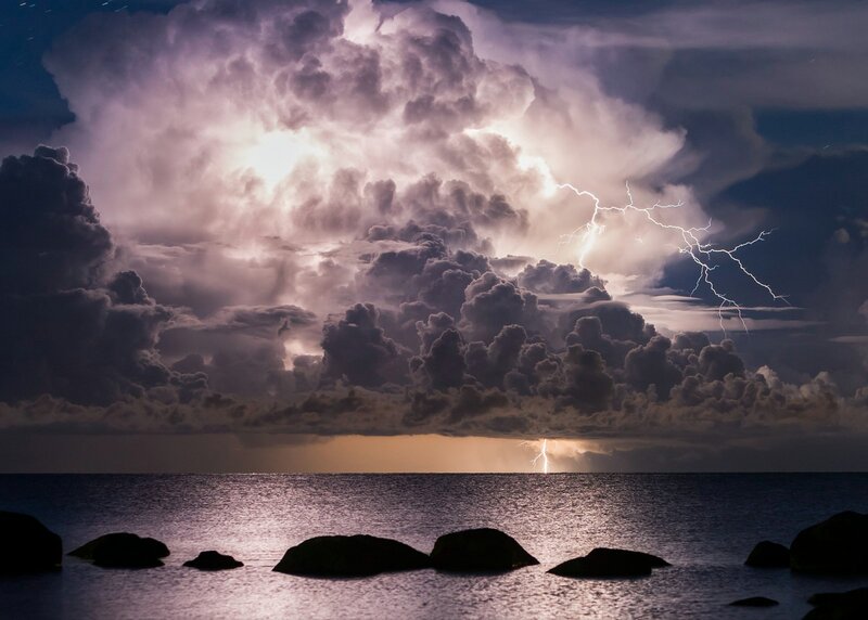 Lightning over Ocean — Purple, Dramatic, Night, Photograph, Clouds, Rocks, Sea