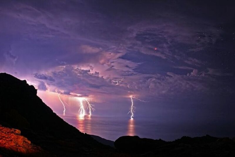 Lightning over Ocean — Purple, Dramatic, Night, Photograph, Mountain