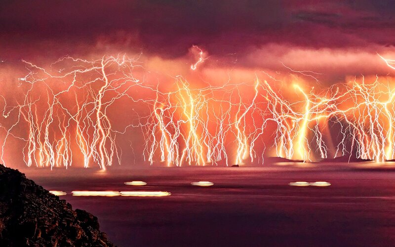 Lightning over Ocean — Purple, Dramatic, Night, Photograph, Sky, Rocks