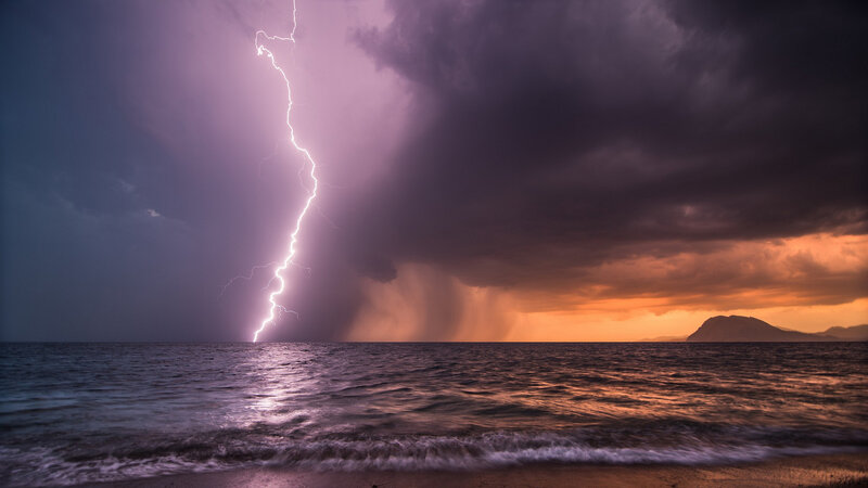 Lightning over Ocean — Purple, Dramatic, Sunset