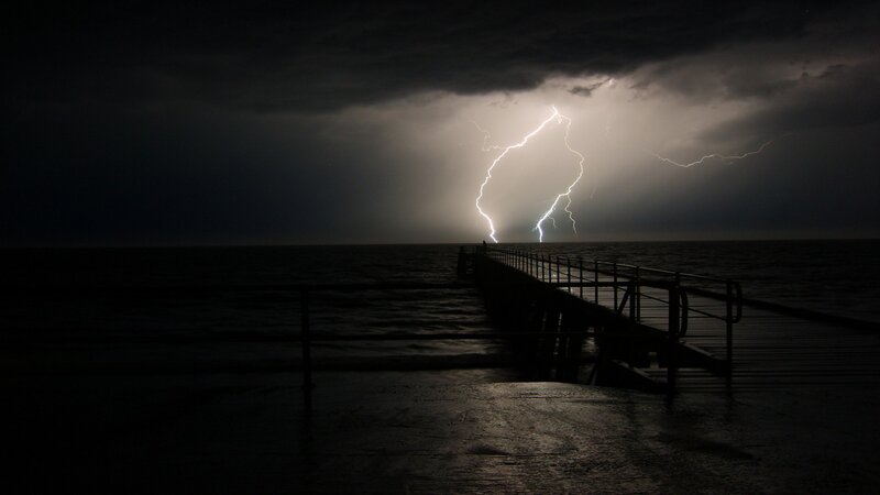 Lightning over Pier — Black, Dramatic