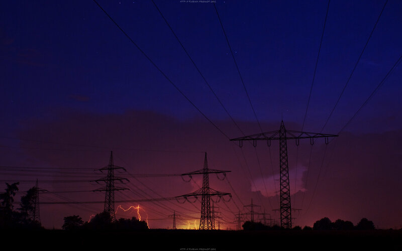 Lightning over power lines