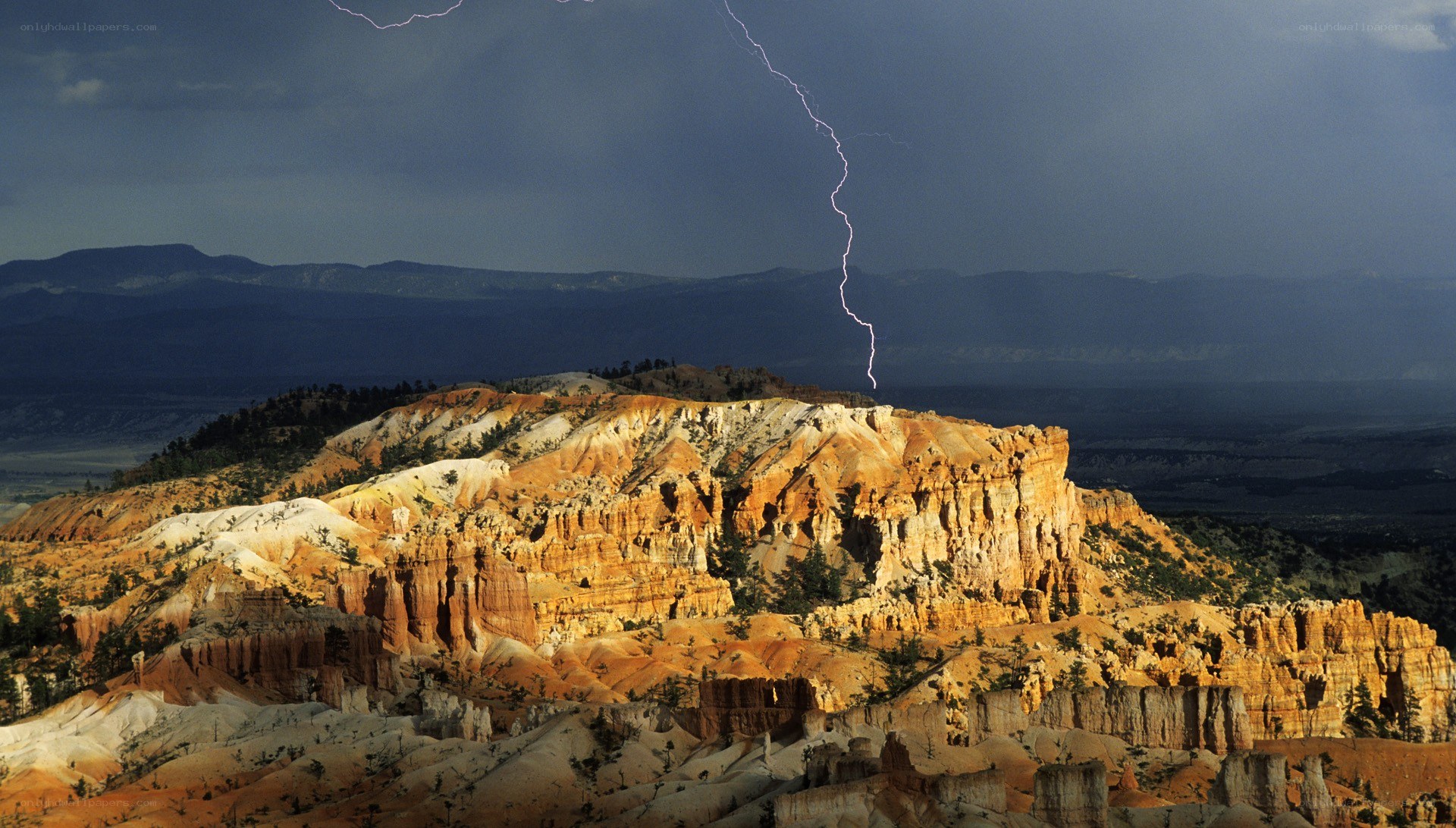 Lightning over red rock canyon