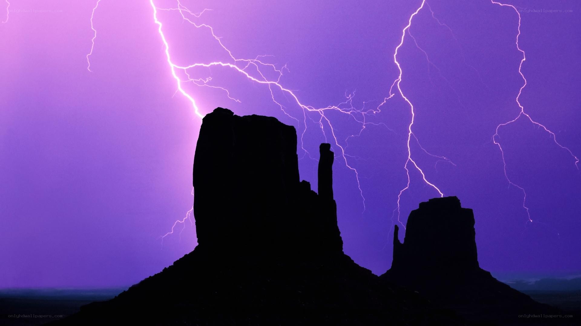 Lightning over rock formations