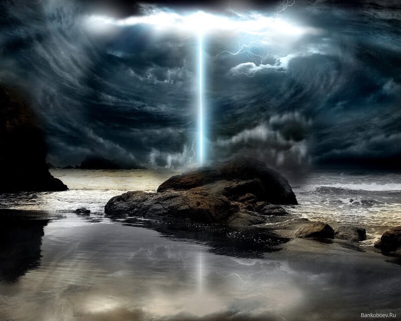 Lightning over rocky shore