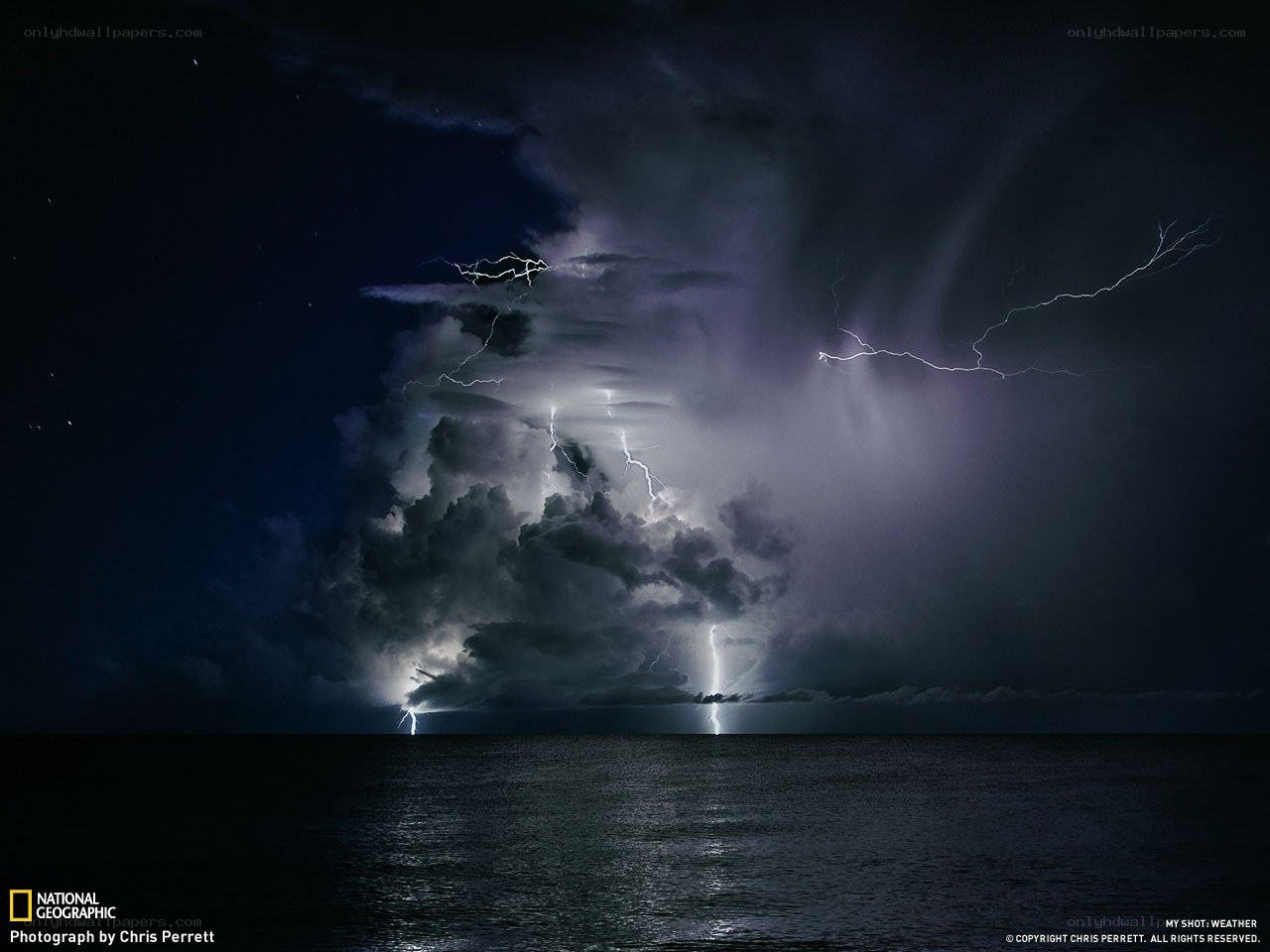 Lightning over the ocean at night