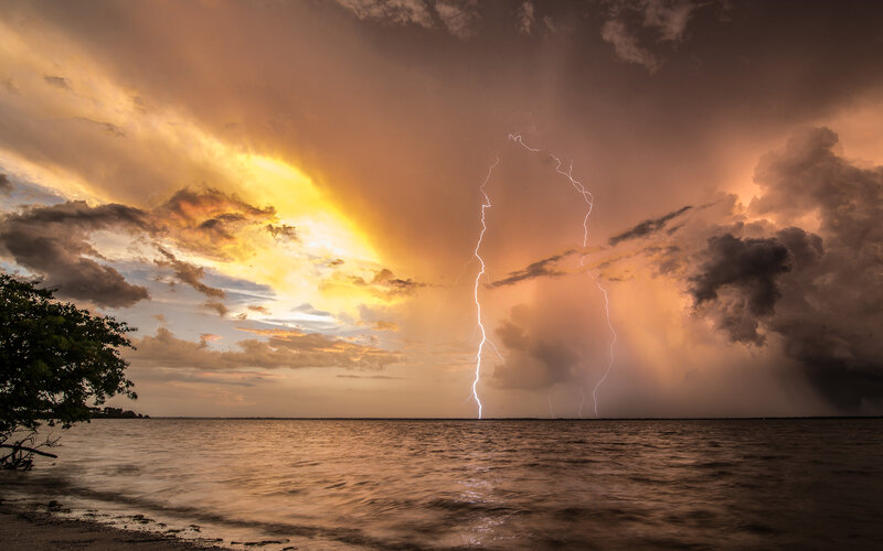 Lightning over Water — Orange, Dramatic