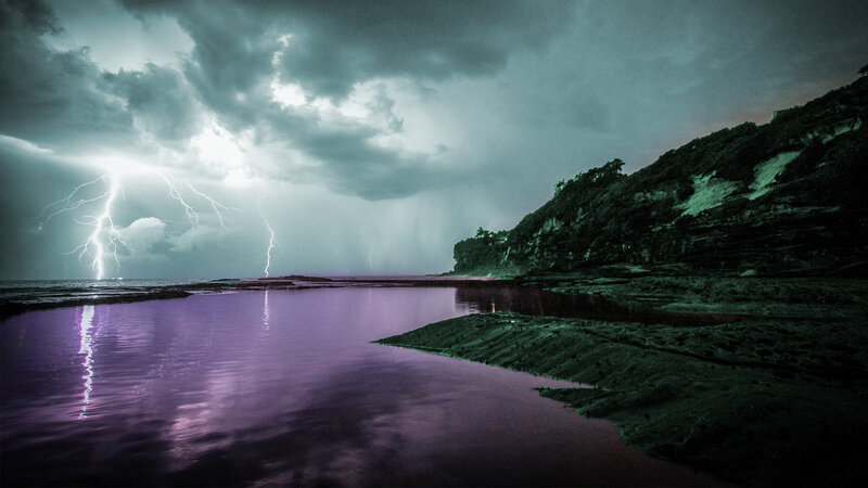 Lightning over Water — Purple, Dramatic, Night, Photograph, Storm, Clouds, Cliff