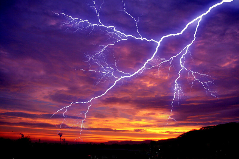 Lightning storm at sunset