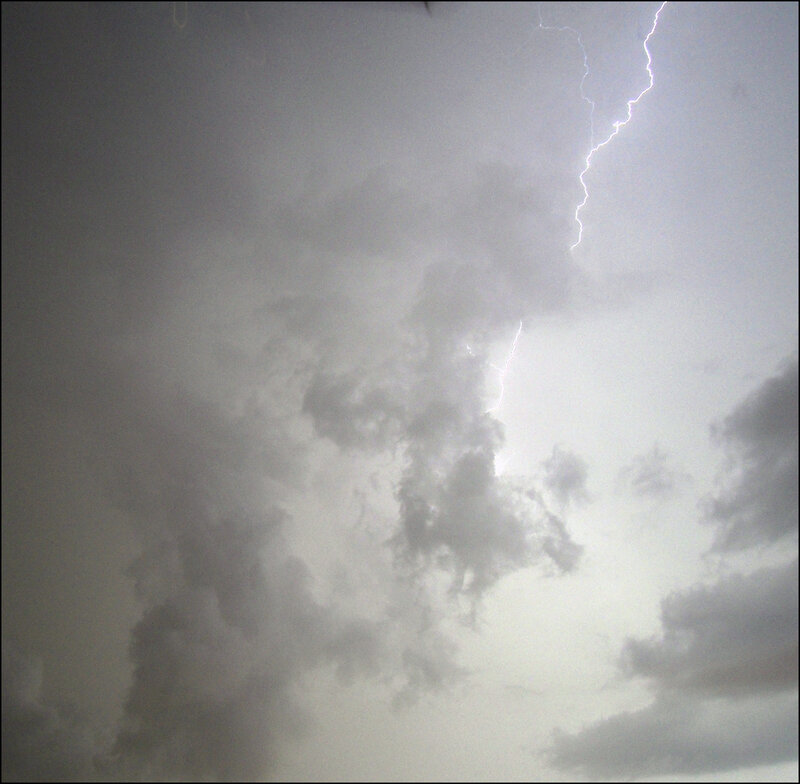 Lightning storm in cloudy sky