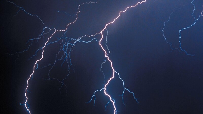 Lightning storm in night sky