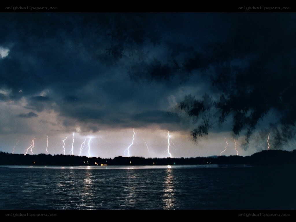 Lightning storm over a lake