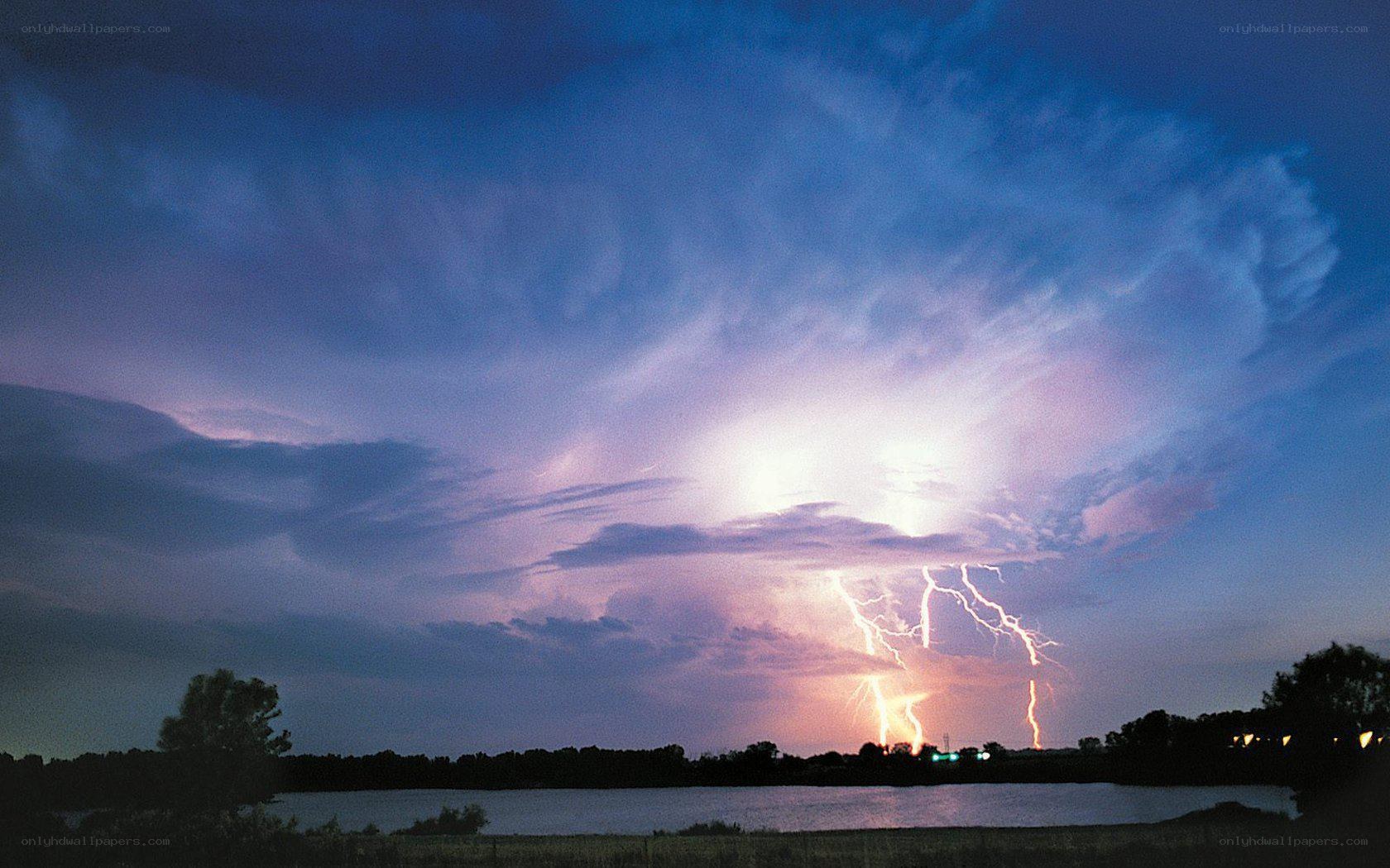 Lightning storm over a lake