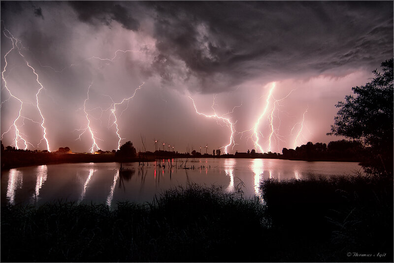 Lightning storm over a lake