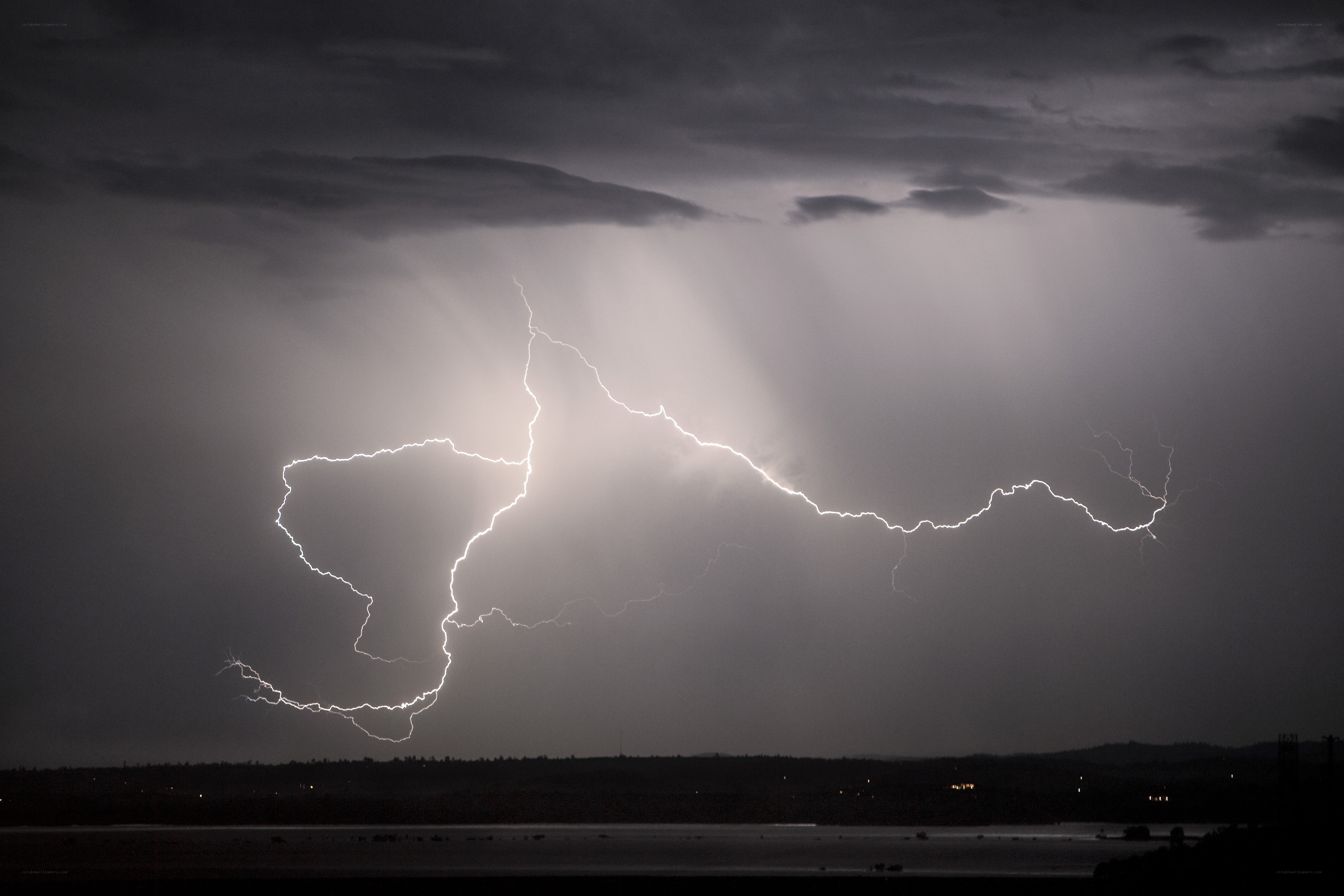 Lightning storm over a lake