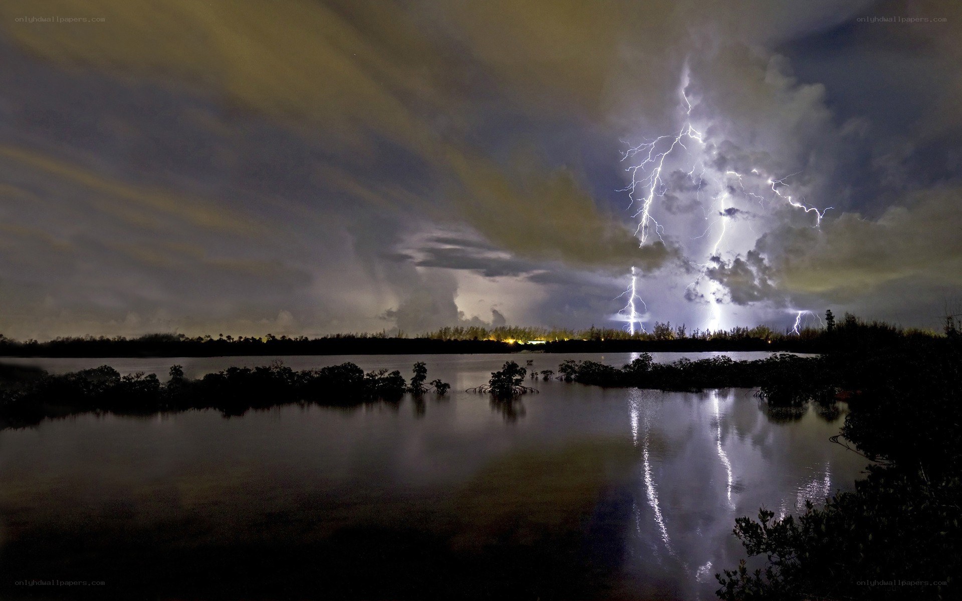 Lightning storm over a lake