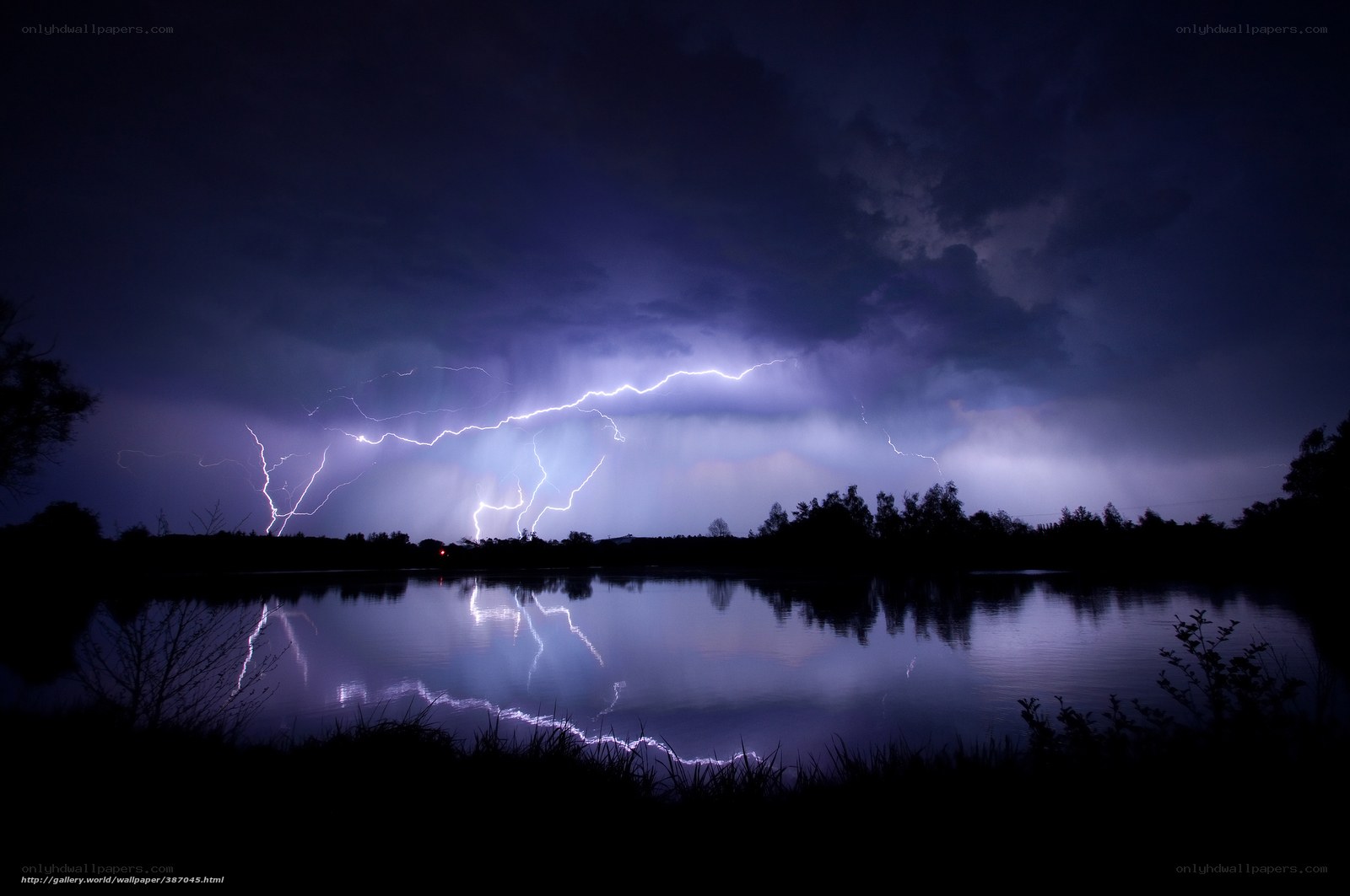 Lightning storm over a lake