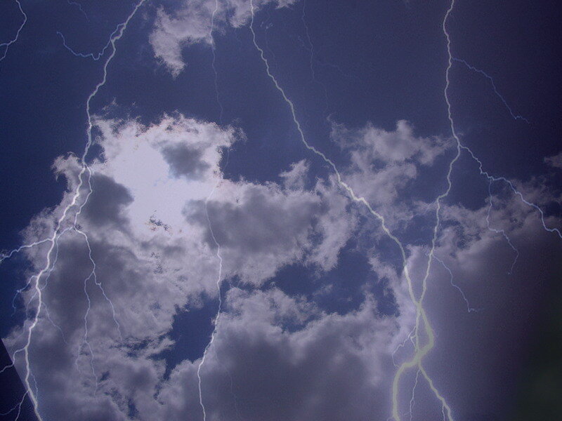 Lightning storm over clouds